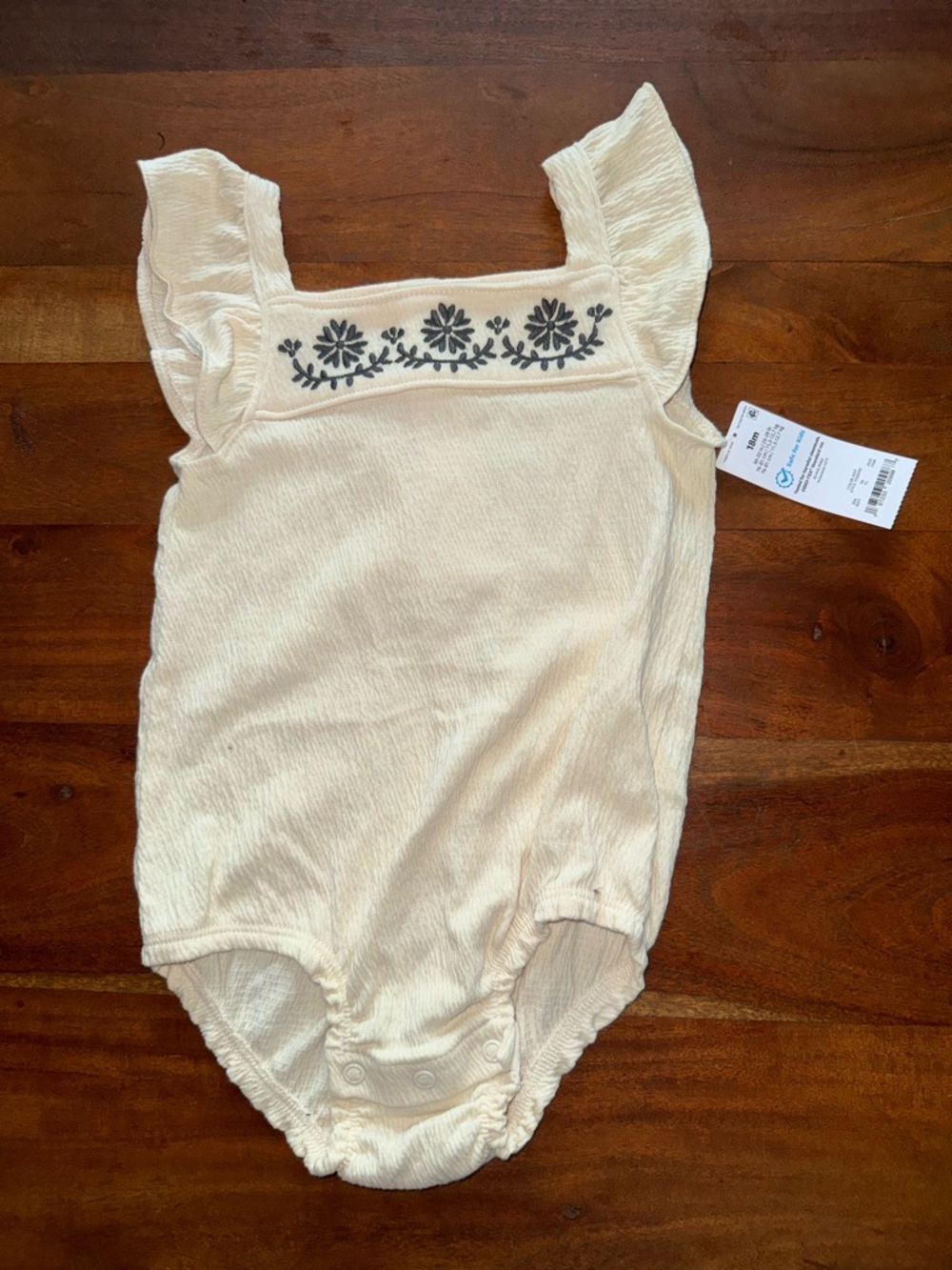 Carter's Cream Romper with Navy Floral Embroidery‎